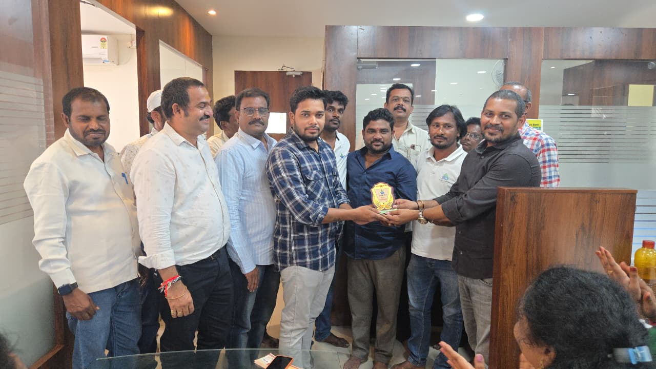 Sai Infra Developers team member Akash receiving the Best Performance recognition for August